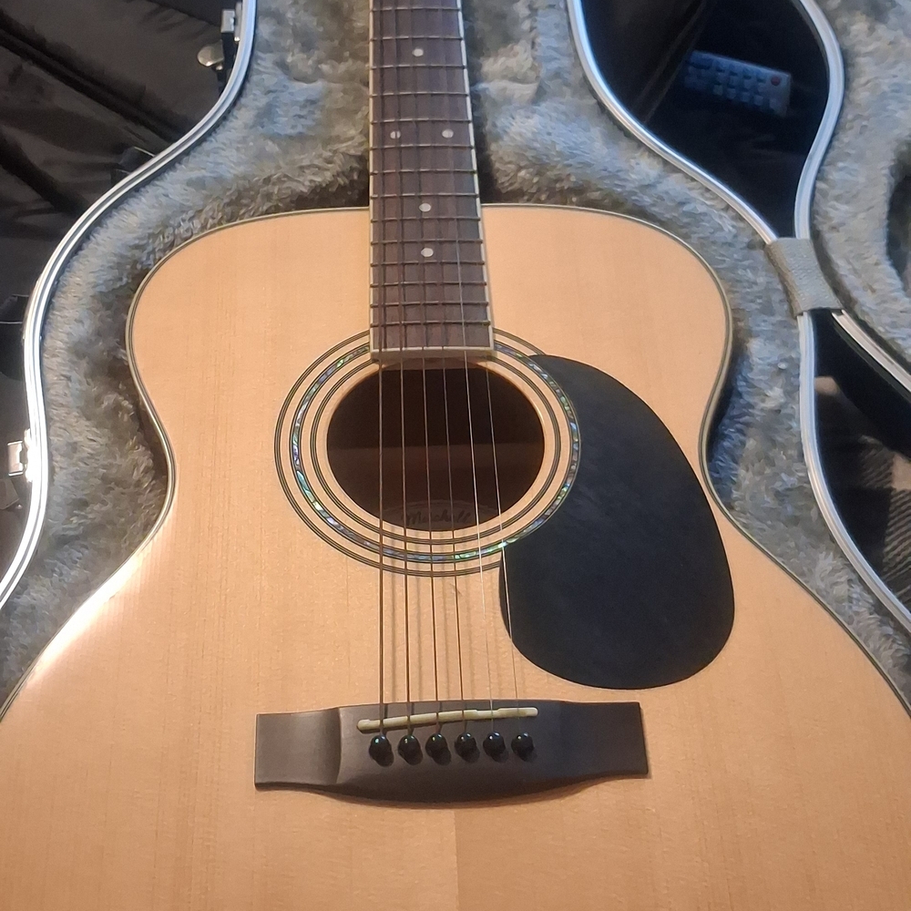 Acoustic Guitar with Black Roadrunner Case